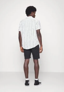 Pier One 2 Pack - Shorts - Black/Olive -Negozio online Pier One Italia 73395e7496094f16ab01d685c224eec1 scaled