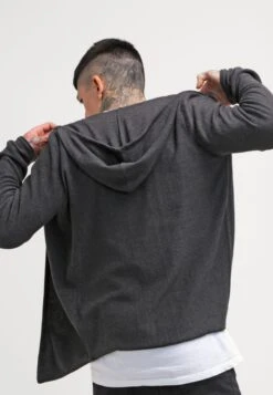 Pier One CardiganMottled Dark Grey Uomo Maglieria PI922Q05L-C11 -Negozio online Pier One Italia bea149fe85464cfc9895f311915f78d6 scaled